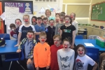 Mary with pupils at Moss Hey Primary School