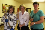 Mary helping to clean up floods